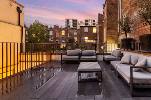 Sink into outdoor sofas as the London sky turns pink