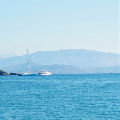 Stroll along the private pathway to Gouvia beach to swim in the sea