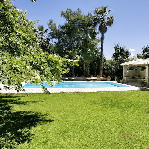 Cool off in the pool while the kids play in the garden