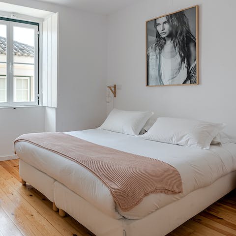 Wake up in the chic bedroom feeling rested and ready for another day of Lisbon sightseeing