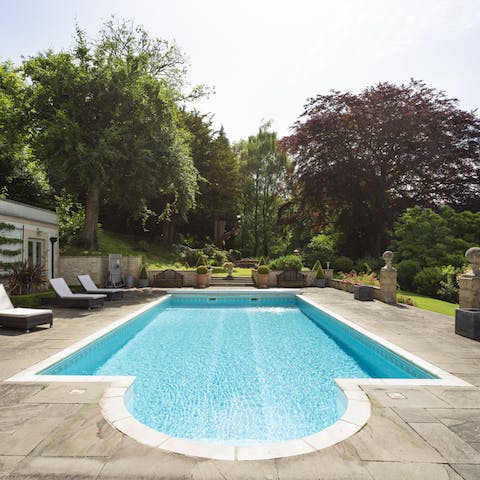 Lounge poolside, slipping into the cool waters whenever you need to refresh