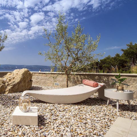 Take an afternoon snooze on the lounge chairs