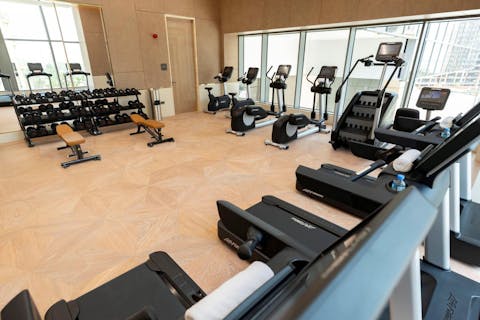 Stay on top of your fitness routine with a workout in the on-site gym