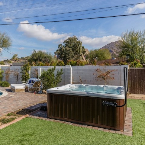 Relax in the hot tub under the stars