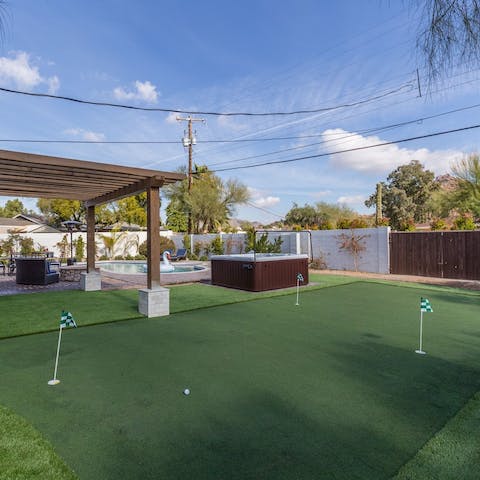 Practise your swing on the private putting green