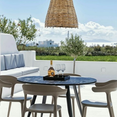 Sit down at the alfresco dining table with breakfast and a good book