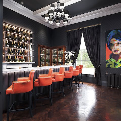 Mix some cocktails at the home's exceptional bar