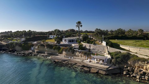Dive straight into clear Sicilian waters from the rock platform