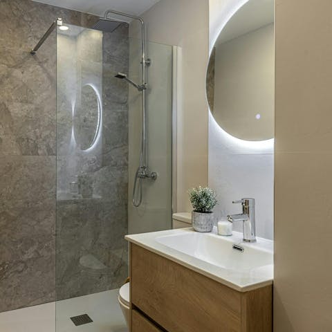 Get ready in the modern bathroom for an evening out in Madrid