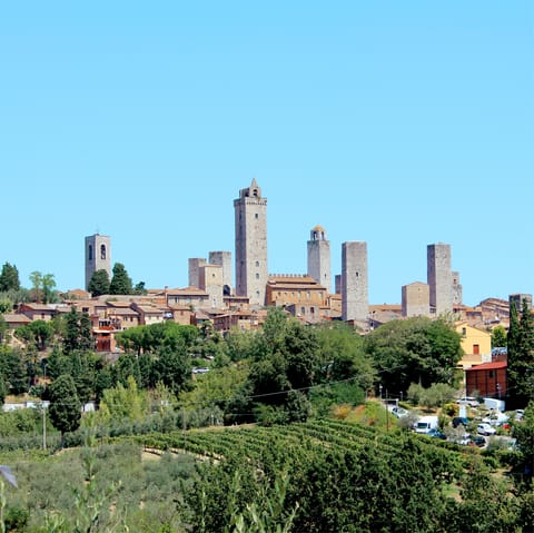 Explore the streets of San Gimignano as the iconic towers surround you