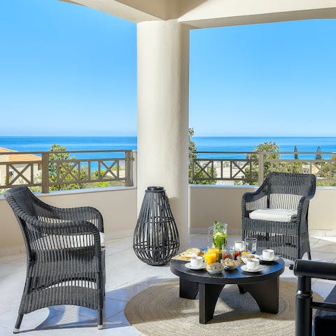 Sip your morning coffee overlooking the Aegean Sea