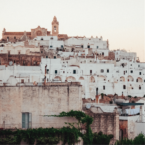Lose yourself in the labyrinthine backstreets of Ostuni, around twenty minutes away