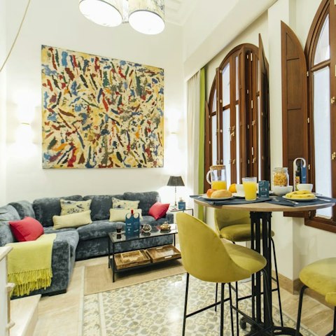 Enjoy a riot of colour against traditional touches inside