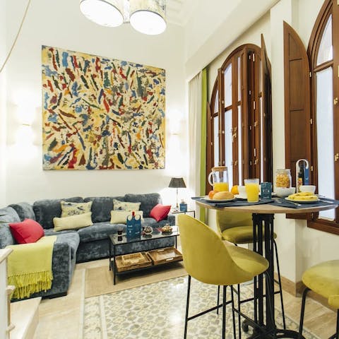 Enjoy a riot of colour against traditional touches inside