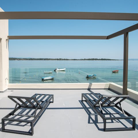 Gaze at stunning sea views from the top-floor terrace