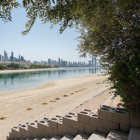 Settle in for a day of sunbathing on the private beach