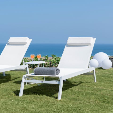 Settle in for an afternoon of sunbathing by the pool