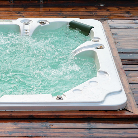 Treat yourself to a long soak in the luxurious hot tub