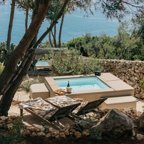 Relax in one of the mini-pools with a view of the Adriatic