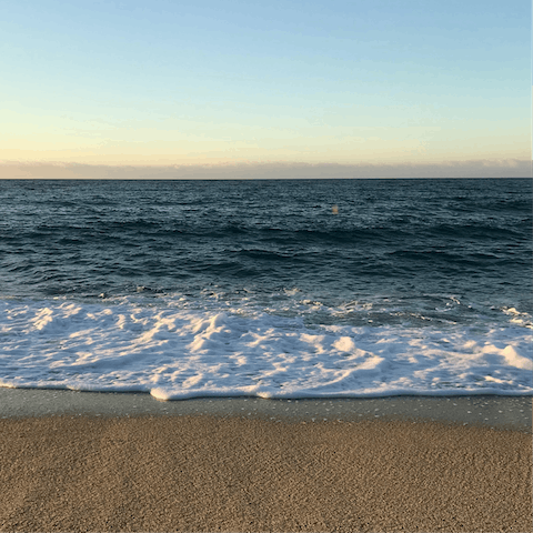 Head to Cala Canyelles Beach for the afternoon, just two-kilometres away