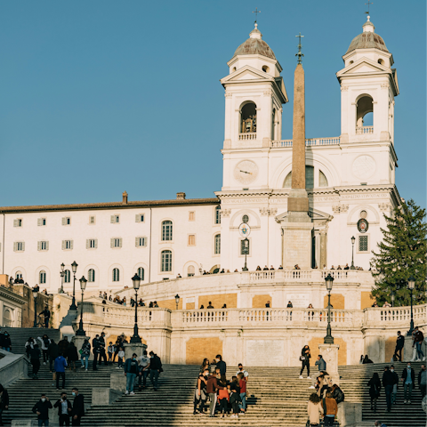 Climb the Spanish Steps, a ten-minute walk away