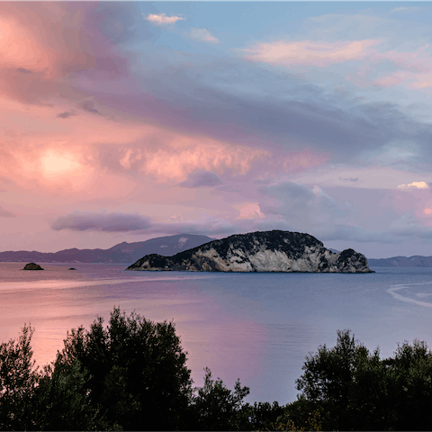 Enjoy stunning views of Marathonisi Island (Turtle Island)