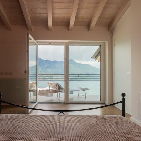 Wake up to lake views from the bedroom