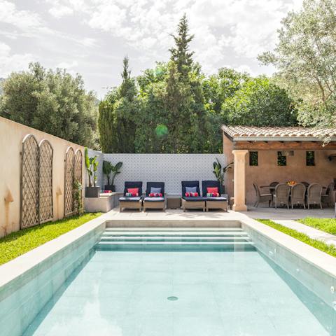 Dive into your private tree-lined pool