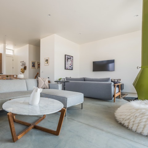 Get your glow on by the indoor fire on cooler nights and break out the home’s games