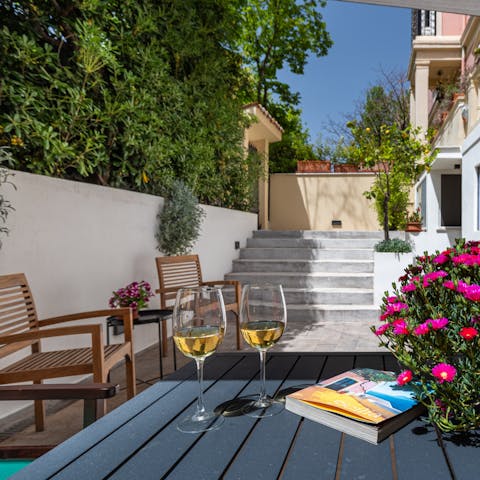 Crack open a bottle of malvasia wine on the patio and relax with a good read