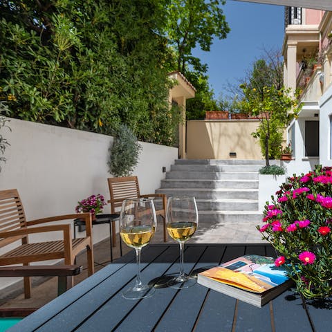 Crack open a bottle of malvasia wine on the patio and relax with a good read
