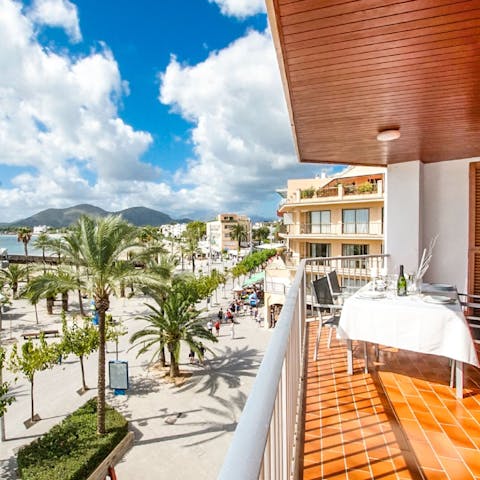Dine alfresco on the private balcony overlooking the ocean