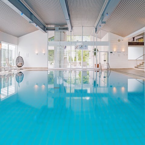 Swim in the residential pool as you admire the verdant view of the surrounding nature