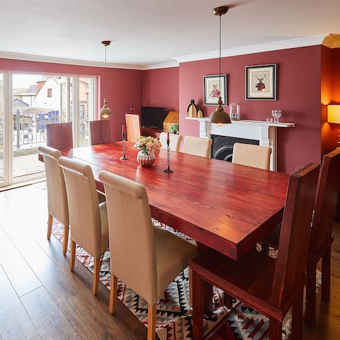 Lay the table for a glamorous dinner party with the balcony doors open wide