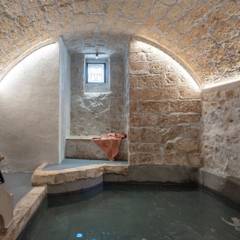Unwind with a soak in the communal bath