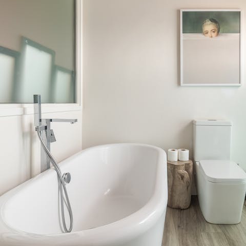 Enjoy a sumptuous soak in the roll-top tub