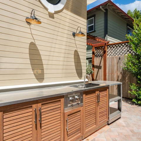 Fire up the grill and prepare alfresco lunches in the outdoor kitchen