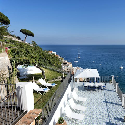 Soak up the sun and sea breeze on one of the terraces
