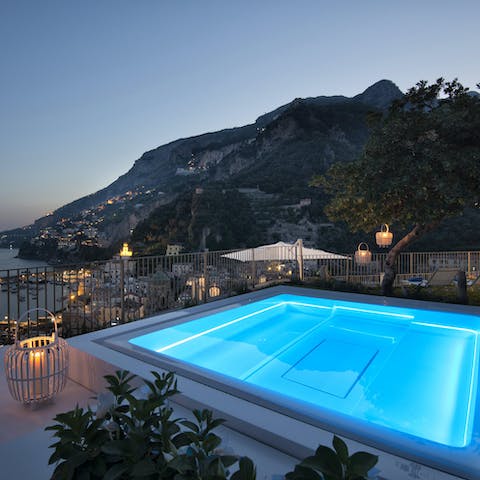 Sink into the hot tub as the stars descend across the sky