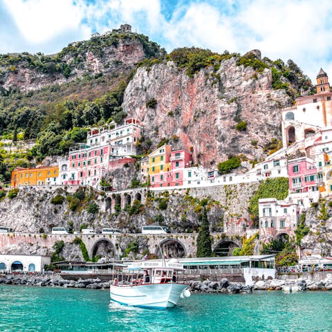 Descend the 300 steps to the waterfront for lunch above the water