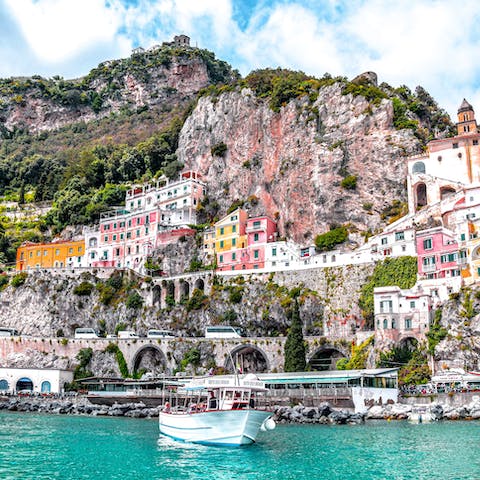 Descend the 300 steps to the waterfront for lunch above the water