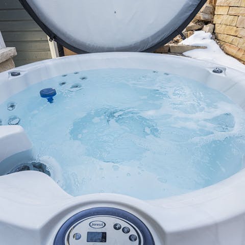Relax in the hot tub after a day of skiing