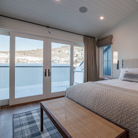Take in the pine-covered mountain views from the balcony