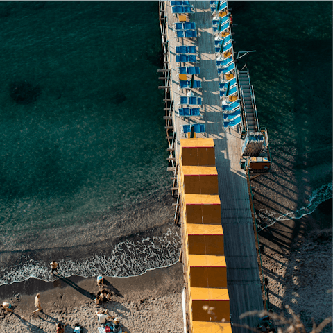 Jump in the cool, crisp waters of Leonelli's Beach, seven-minute walk away