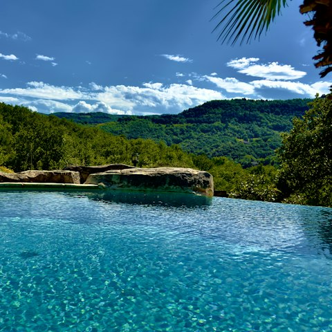 Enjoy a dip in the pool with views across the surrounding countryside