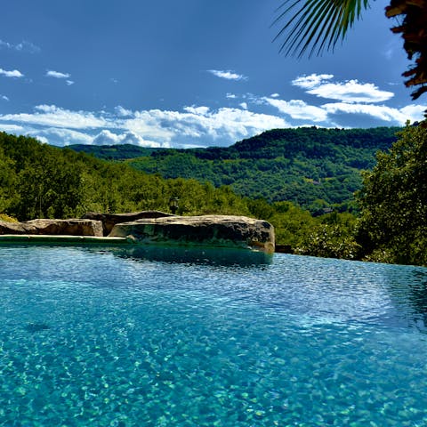 Enjoy a dip in the pool with views across the surrounding countryside