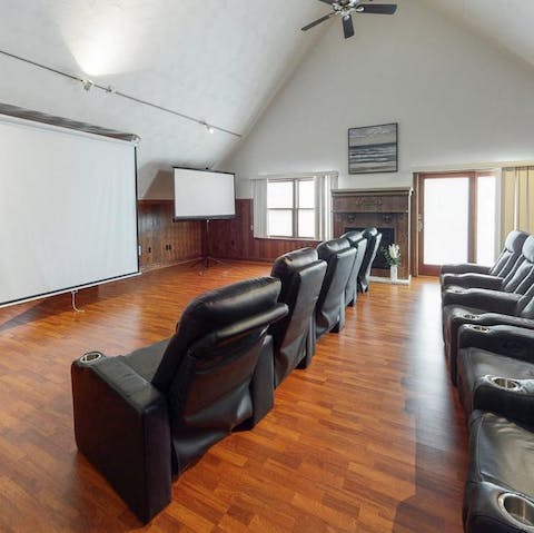 Enjoy private screenings in the home cinema room
