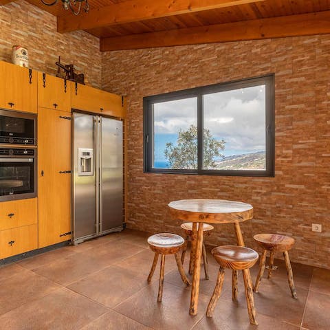 Hang out in the summer kitchen and try Madeira wine ahead of a barbecue supper