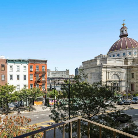 Take in the views over this New York district from one of two balconies
