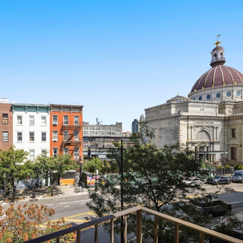 Take in the views over this New York district from one of two balconies